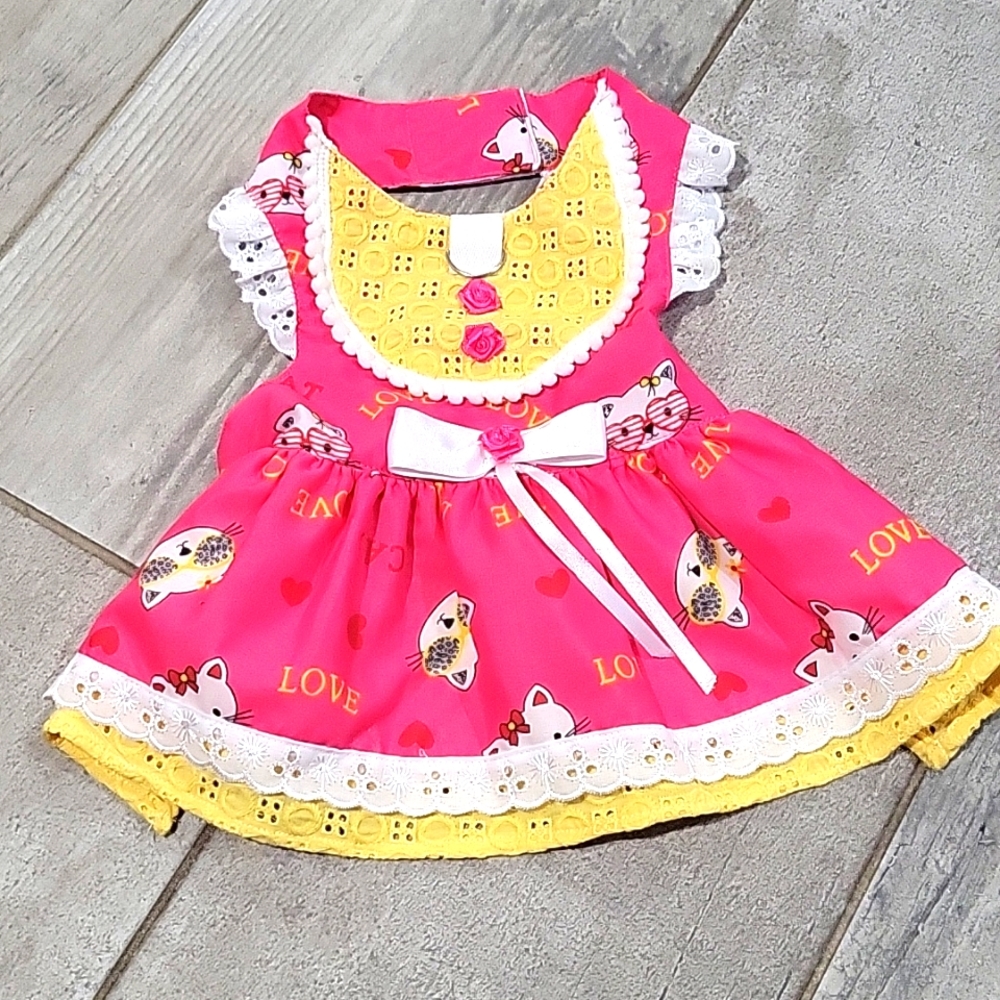 Handmade  doggie dress pink fits Yorkie, Maltese its  adjusted for a perfect fit